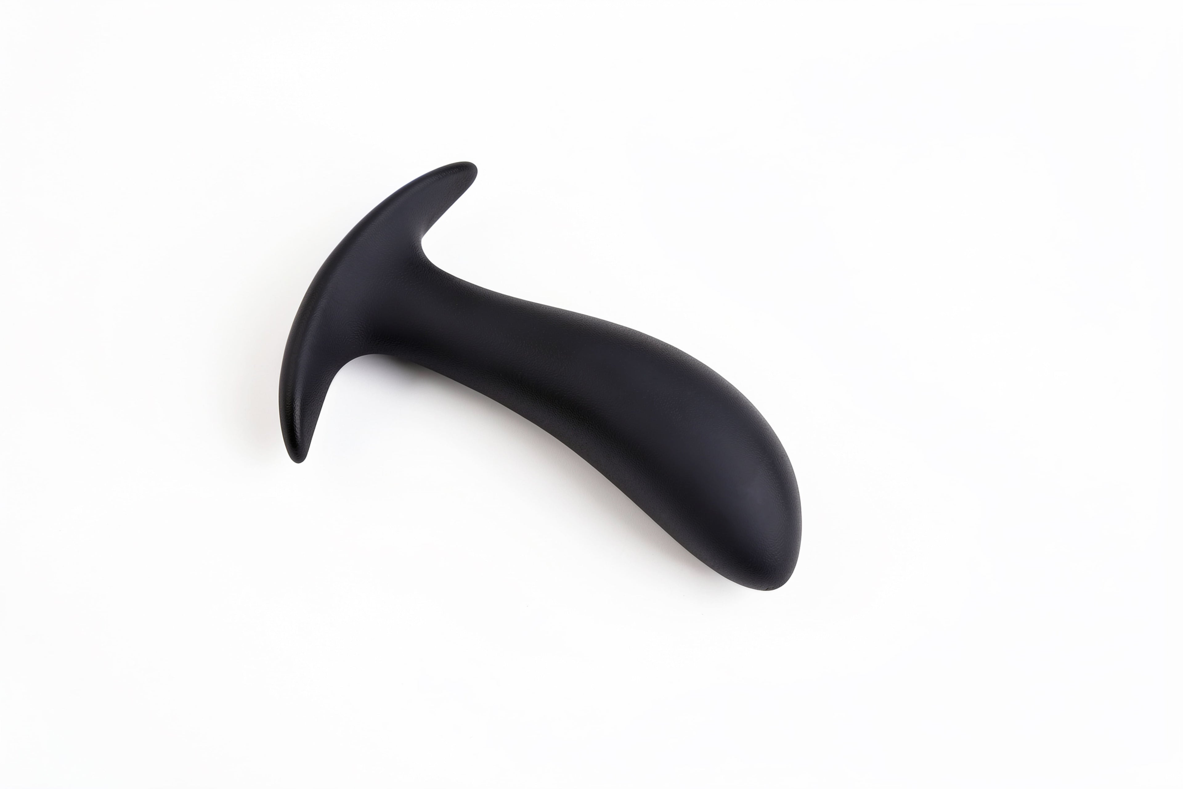 side view of vibrating anal plug with ergonomic curve and remote control